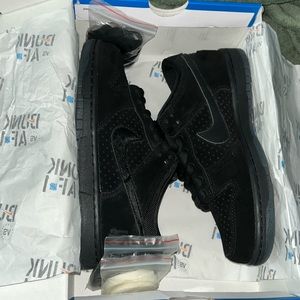 Nike Dunk Lows Undefeated